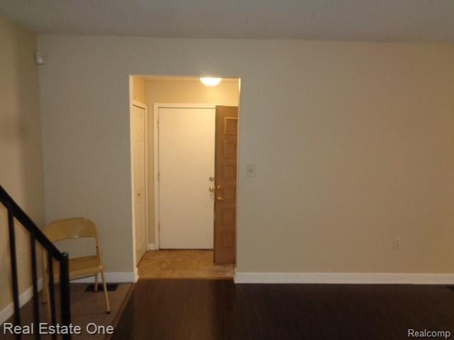 26537 Summerdale Dr, Southfield, MI 48033 - empty room with wood finished floors and baseboards