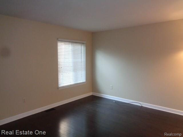 26537 Summerdale Dr, Southfield, MI 48033 - unfurnished room featuring dark wood finished floors and baseboards