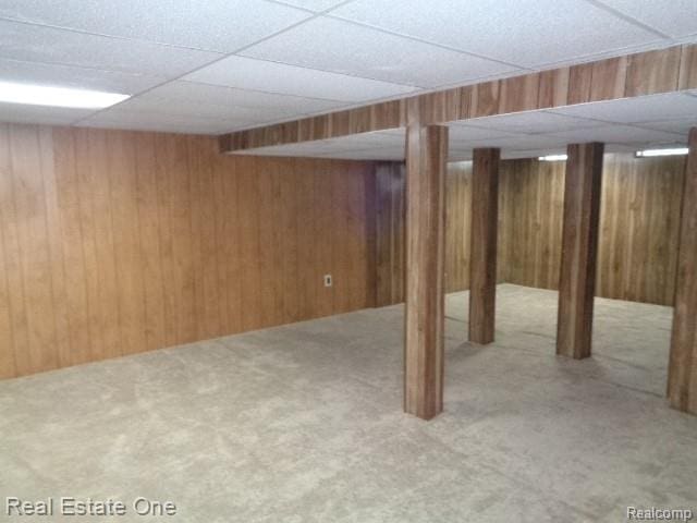 26537 Summerdale Dr, Southfield, MI 48033 - finished below grade area featuring carpet, wood walls, and a drop ceiling