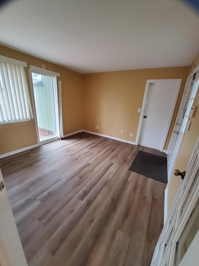 2828 Packard St, Ann Arbor, MI 48108 - unfurnished room with wood finished floors and baseboards