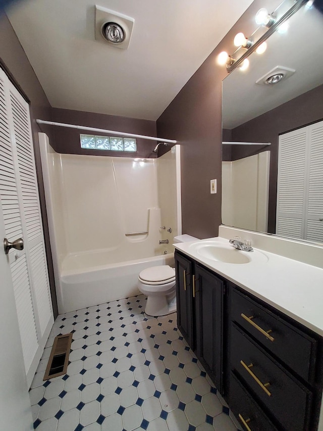 2828 Packard St, Ann Arbor, MI 48108 - full bathroom featuring a closet, shower / washtub combination, vanity, and tile patterned floors