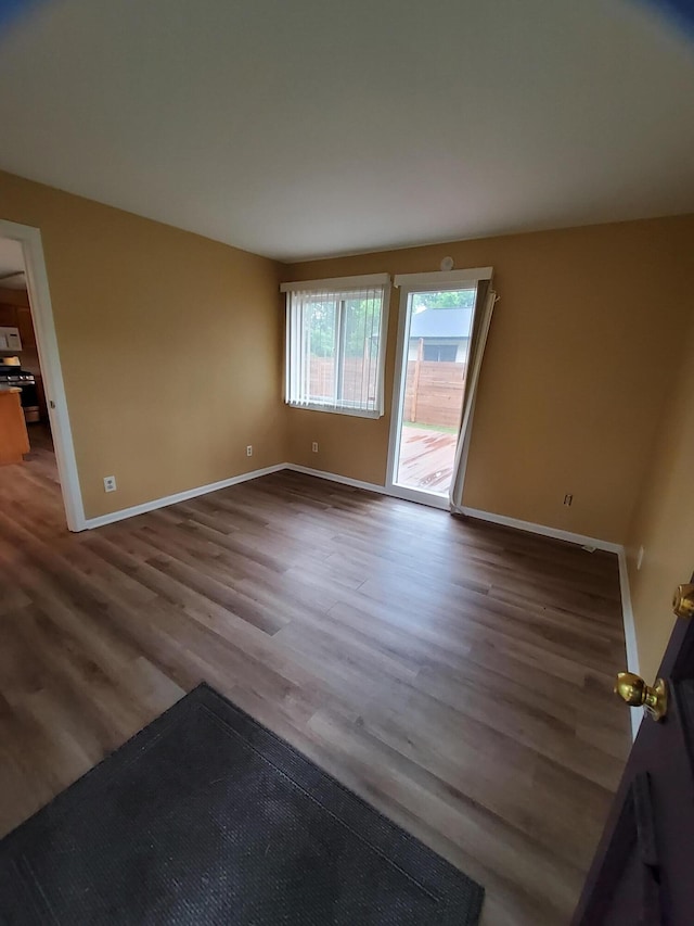 2828 Packard St, Ann Arbor, MI 48108 - empty room with wood finished floors and baseboards