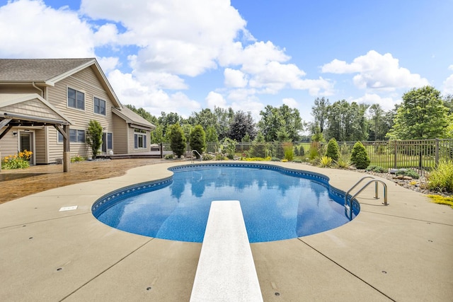 12500 Round Lake Rd, Horton, MI 49246 - view of swimming pool with a diving board