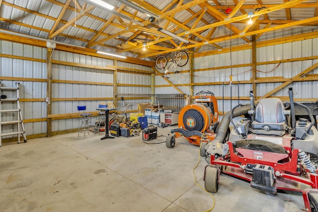 12500 Round Lake Rd, Horton, MI 49246 - garage featuring metal wall