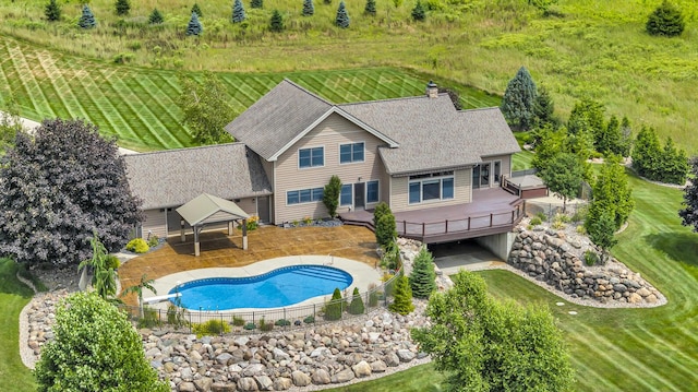 12500 Round Lake Rd, Horton, MI 49246 - back of house with a gazebo, a wooden deck, a chimney, and a shingled roof