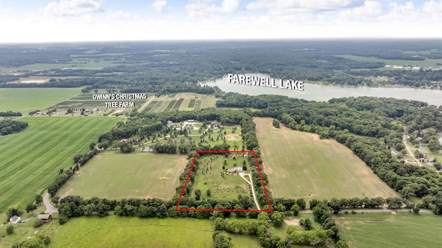 12500 Round Lake Rd, Horton, MI 49246 - overview of rural landscape featuring property boundaries highlighted, a large body of water, and farmland