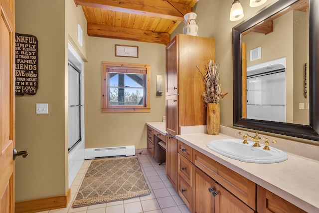 12500 Round Lake Rd, Horton, MI 49246 - bathroom featuring a baseboard heating unit, a wood ceiling with exposed beams, vanity, and tile patterned flooring