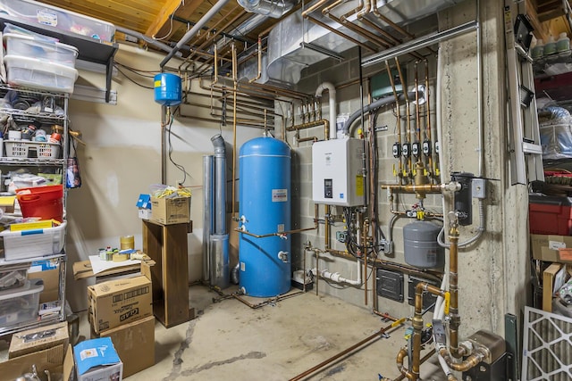 12500 Round Lake Rd, Horton, MI 49246 - utilities with water heater and tankless water heater