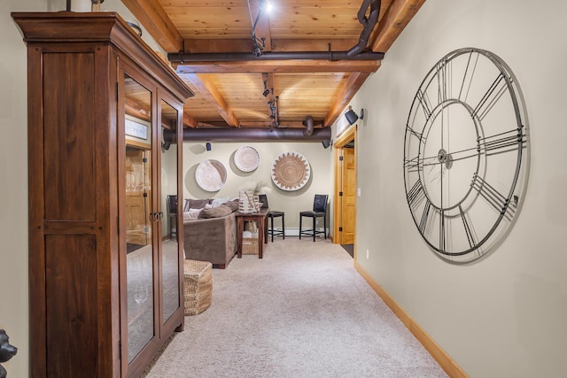 12500 Round Lake Rd, Horton, MI 49246 - corridor featuring a wood ceiling with exposed beams and carpet floors