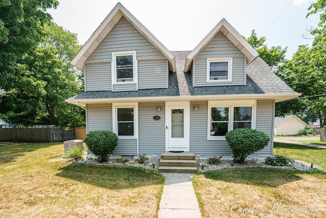 126 E Cherry St, Wayland, MI 49348 - view of front facade with roof with shingles