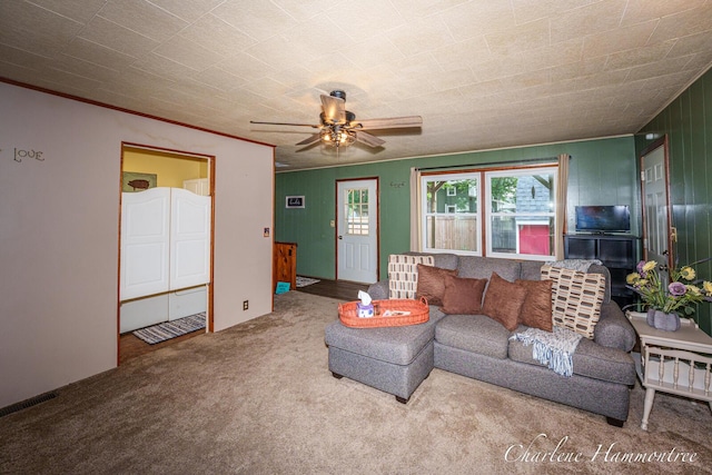 126 E Cherry St, Wayland, MI 49348 - carpeted living room with a ceiling fan and ornamental molding