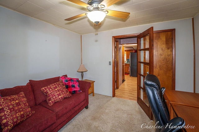 126 E Cherry St, Wayland, MI 49348 - living area with a desk, a ceiling fan, and light carpet
