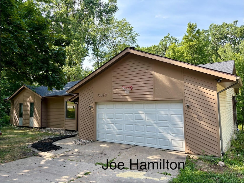 5497 Coit Ave NE, Grand Rapids, MI 49525 - view of front of house with a shingled roof