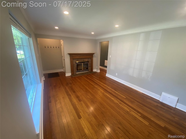 1417 N Maple Ave, Royal Oak, MI 48067 - unfurnished living room with dark wood-style floors, a fireplace, recessed lighting, and ornamental molding