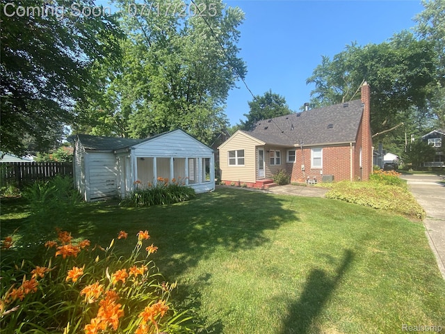 1417 N Maple Ave, Royal Oak, MI 48067 - back of property with brick siding and a chimney