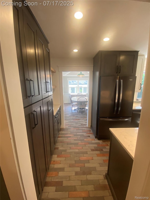 1417 N Maple Ave, Royal Oak, MI 48067 - corridor with recessed lighting and brick floors