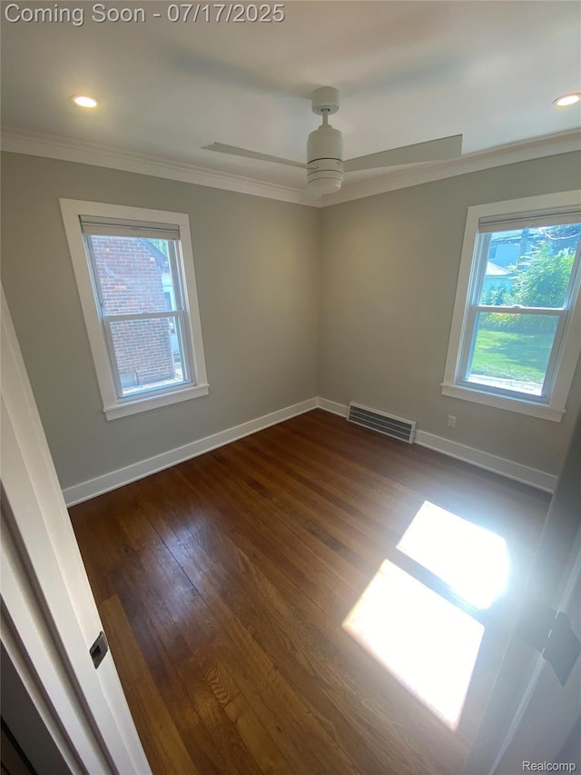 1417 N Maple Ave, Royal Oak, MI 48067 - spare room featuring healthy amount of natural light, crown molding, dark wood-type flooring, ceiling fan, and recessed lighting