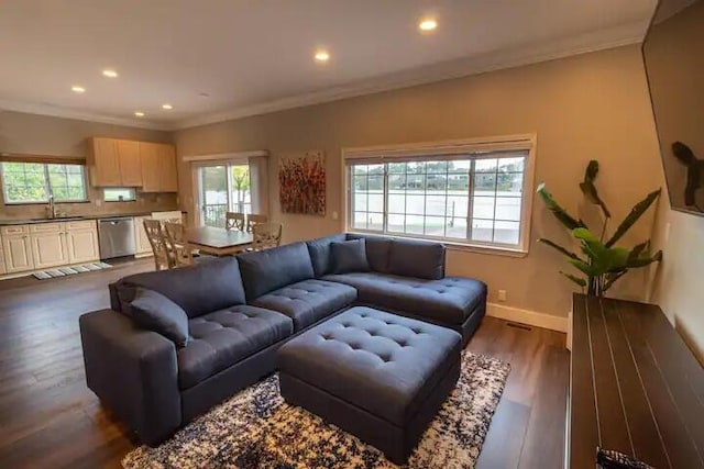 3165 Kenrick St, Keego Harbor, MI 48320 - living area featuring plenty of natural light, recessed lighting, crown molding, and dark wood finished floors
