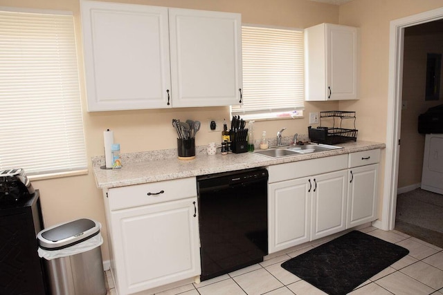 9641 Wilkie St, Taylor, MI 48180 - kitchen featuring black dishwasher, white cabinets, light tile patterned floors, and light countertops