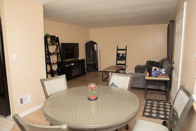 9641 Wilkie St, Taylor, MI 48180 - dining area with baseboards and wood finished floors