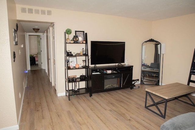 9641 Wilkie St, Taylor, MI 48180 - living room with wood finished floors and baseboards