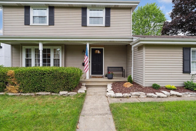 539 Old Bridge Rd, Grand Blanc, MI 48439 - traditional-style home featuring a porch and a front yard