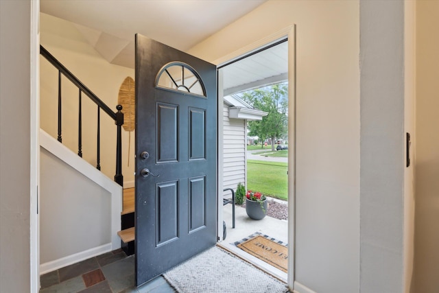 539 Old Bridge Rd, Grand Blanc, MI 48439 - entryway with stairs and stone finish flooring