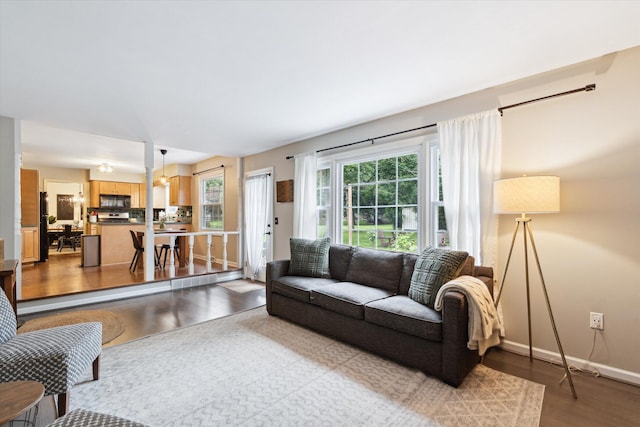 539 Old Bridge Rd, Grand Blanc, MI 48439 - living room with wood finished floors and baseboards