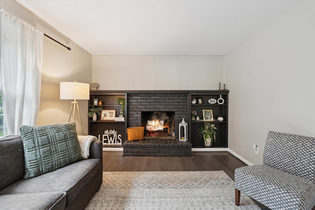 539 Old Bridge Rd, Grand Blanc, MI 48439 - living area featuring wood finished floors and a fireplace