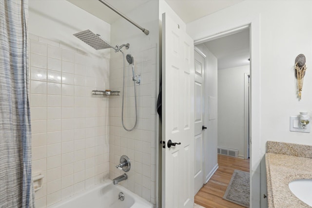 539 Old Bridge Rd, Grand Blanc, MI 48439 - bathroom with shower / bath combination with curtain, vanity, and wood finished floors