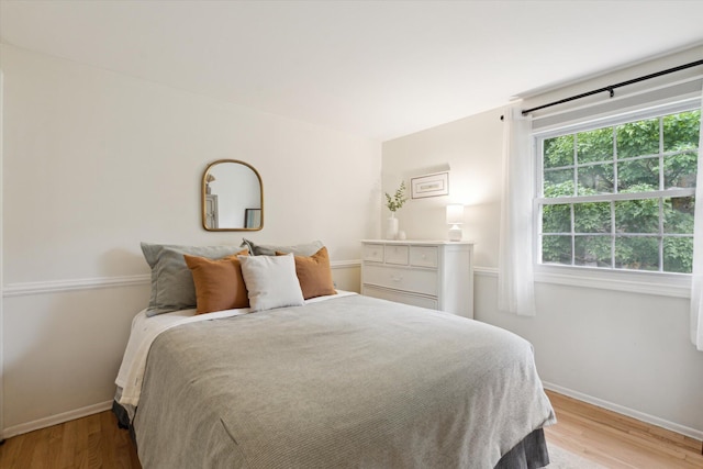 539 Old Bridge Rd, Grand Blanc, MI 48439 - bedroom featuring baseboards and light wood-style flooring