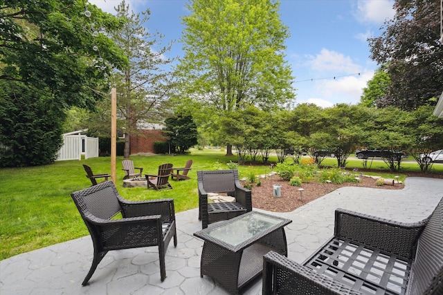 539 Old Bridge Rd, Grand Blanc, MI 48439 - view of patio featuring a fire pit and a shed