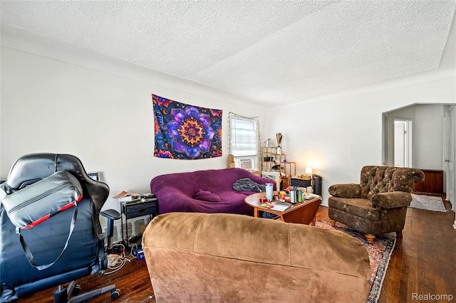 18995 Fielding St, Detroit, MI 48219 - living area with dark wood finished floors and a textured ceiling
