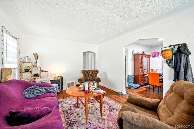 18995 Fielding St, Detroit, MI 48219 - living area with a textured ceiling and wood finished floors