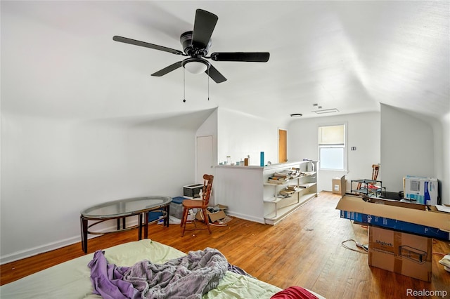 18995 Fielding St, Detroit, MI 48219 - living room featuring a ceiling fan, wood finished floors, and lofted ceiling