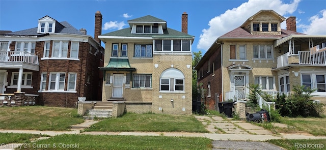 2254 Taylor St, Detroit, MI 48206 - view of front of home featuring a chimney and brick siding