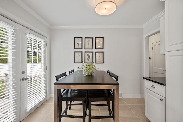 2213 N Wilson Ave, Royal Oak, MI 48073 - dining space with light tile patterned floors and crown molding