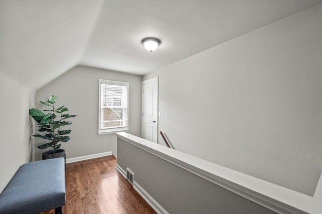 2213 N Wilson Ave, Royal Oak, MI 48073 - hallway featuring dark wood-style flooring, an upstairs landing, and vaulted ceiling