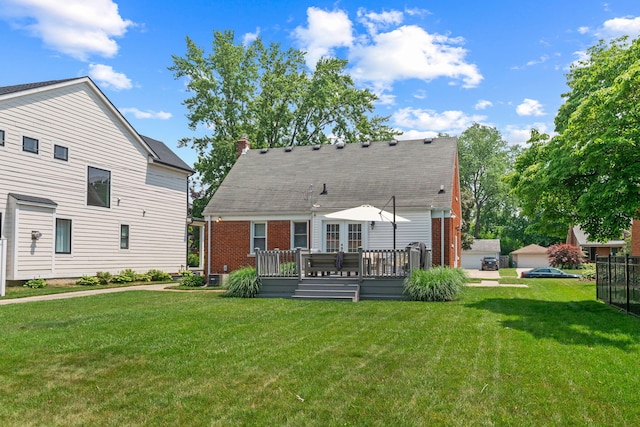 2213 N Wilson Ave, Royal Oak, MI 48073 - rear view of property with brick siding, a yard, a deck, and a chimney
