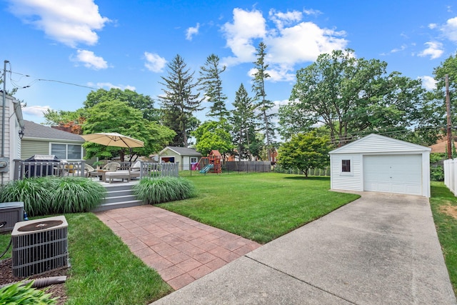 2213 N Wilson Ave, Royal Oak, MI 48073 - view of yard featuring a playground, an outbuilding, a wooden deck, concrete driveway, and a garage