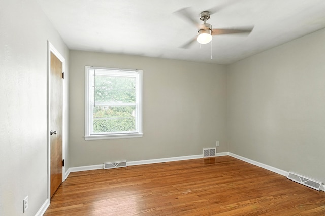 2707 Byron Center Ave SW, Wyoming, MI 49519 - empty room with light wood finished floors and ceiling fan