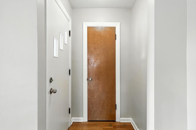 2707 Byron Center Ave SW, Wyoming, MI 49519 - doorway to outside featuring wood finished floors and baseboards