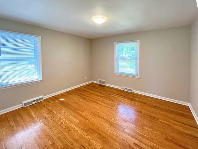 2707 Byron Center Ave SW, Wyoming, MI 49519 - spare room featuring light wood-type flooring and baseboards