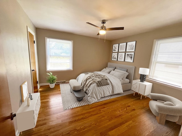 2707 Byron Center Ave SW, Wyoming, MI 49519 - bedroom featuring wood finished floors and a ceiling fan