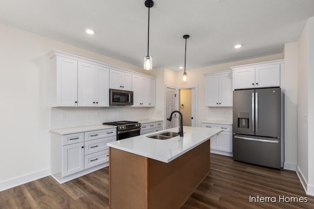 3351 Kings River St SW Unit 35, Wyoming, MI 49418 - kitchen with stainless steel appliances, white cabinets, tasteful backsplash, dark wood finished floors, and recessed lighting