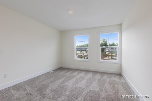3351 Kings River St SW Unit 35, Wyoming, MI 49418 - spare room with light carpet