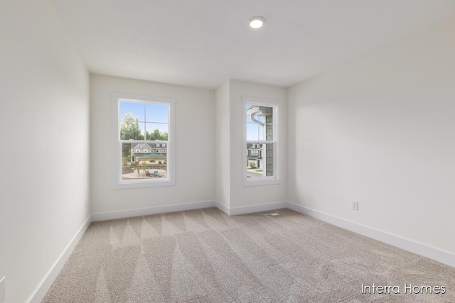 3351 Kings River St SW Unit 35, Wyoming, MI 49418 - unfurnished room featuring carpet and baseboards