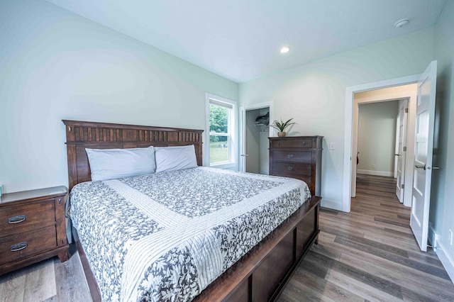 7898 W Juniper Beach Rd, Mears, MI 49436 - bedroom with wood finished floors and recessed lighting
