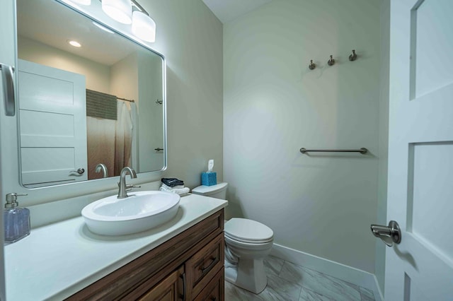 7898 W Juniper Beach Rd, Mears, MI 49436 - bathroom featuring vanity and marble look tile flooring