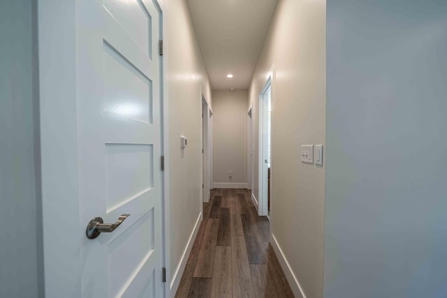 7898 W Juniper Beach Rd, Mears, MI 49436 - hallway featuring dark wood finished floors and recessed lighting